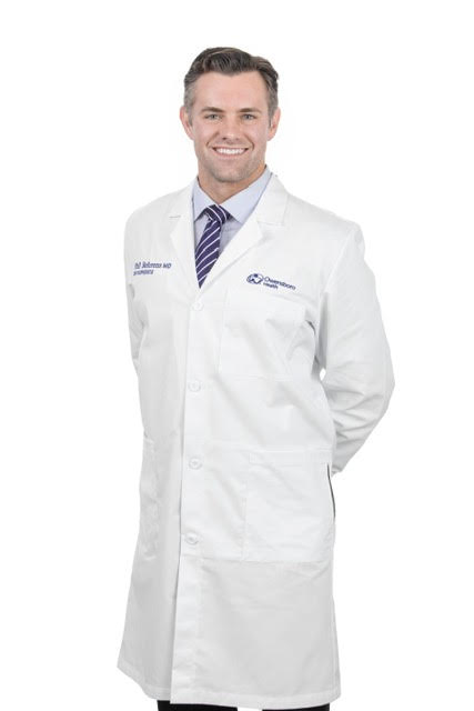 Dr. Behrens professional photo in lab coat